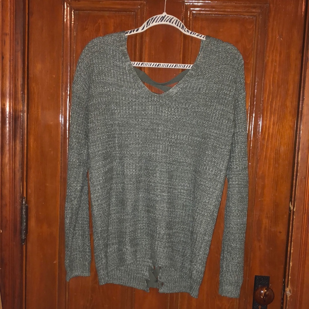 Green V-neck cross stitch back sweater